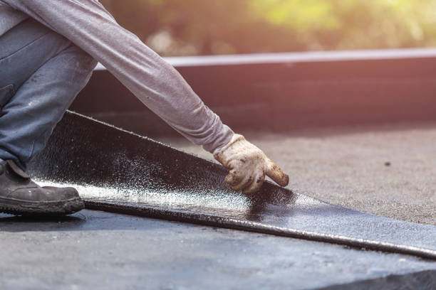 Professional Waterproofing technician working in Oneonta, NY